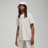 JORDAN ESSENTIALS FLIGHT 23 GX TEE LT OREWOOD BRN/WHITE